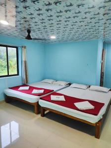 Katil atau katil-katil dalam bilik di Galaxy Beach Stay