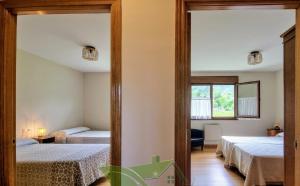 Ένα ή περισσότερα κρεβάτια σε δωμάτιο στο Casa La Llosa