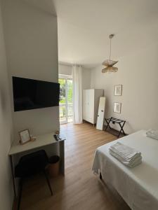 TV a/nebo společenská místnost v ubytování Casa Botanya - Rooms
