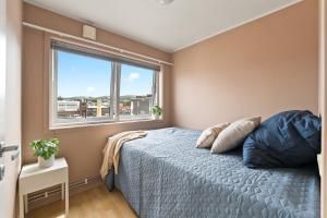 Postel nebo postele na pokoji v ubytování Penthouse 3-Story with 2 Terraces & Balcony