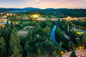 an aerial view of a town with a river at Airy and Open Corner Loft - 92 Walkscore in Redmond