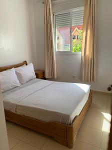 Postel nebo postele na pokoji v ubytování Lolla home