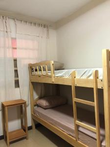 Letto o letti in una camera di Frida Hostel
