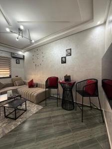 Posezení v ubytování Appartement Marrakech à 5 min de l'Aéroport
