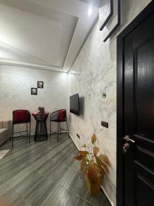 Posezení v ubytování Appartement Marrakech à 5 min de l'Aéroport