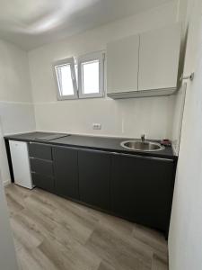 Köök või kööginurk majutusasutuses Apartment's Meti