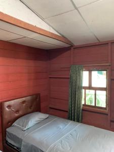 Ένα ή περισσότερα κρεβάτια σε δωμάτιο στο Ibiza Eco Aventura