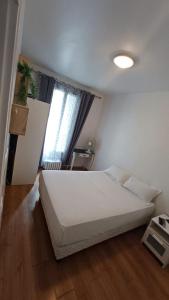 Ένα ή περισσότερα κρεβάτια σε δωμάτιο στο Josef appartment