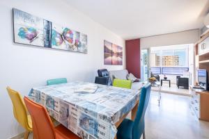 a dining room with a table and chairs at Gemelos 22 Resort Apartment 2-15-B Levante Beach in Benidorm