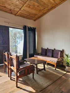 Posezení v ubytování ilika Resort, Pauri