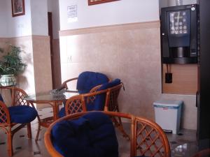 A seating area at Hostal Toscano