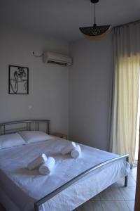 Ένα ή περισσότερα κρεβάτια σε δωμάτιο στο Chalou Stay - Comfort Near Airport