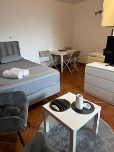 Ένα ή περισσότερα κρεβάτια σε δωμάτιο στο Lana Apartment