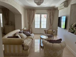 Χώρος καθιστικού στο Villa Gloria Nouvel Hôte