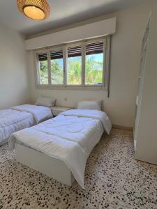 Ένα ή περισσότερα κρεβάτια σε δωμάτιο στο Sunlight apartment