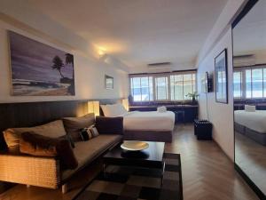 Кровать или кровати в номере Somewhere to Escape - Hometel