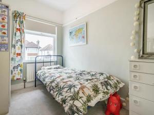Ένα ή περισσότερα κρεβάτια σε δωμάτιο στο Belfast Quarters Stormont Place