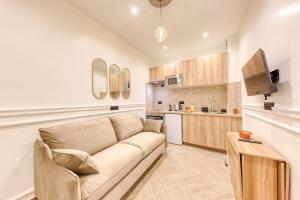 Η κουζίνα ή μικρή κουζίνα στο Luxury apartment in St Maurice near Paris