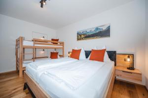 Postel nebo postele na pokoji v ubytování Ferienwohnung Ida inkl SommerCard