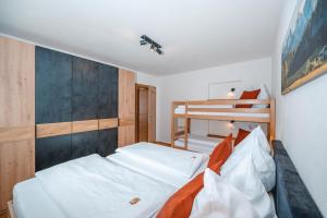 Postel nebo postele na pokoji v ubytování Ferienwohnung Ida inkl SommerCard