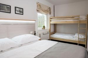 Posteľ alebo postele v izbe v ubytovaní Horský Hotel Dobrá Chata