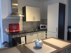 Η κουζίνα ή μικρή κουζίνα στο Gîte au coeur de Colmar