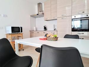 Η κουζίνα ή μικρή κουζίνα στο Appartamento Aurora in Valtellina - Accogliente alloggio tra lago e montagna