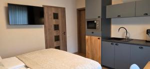 Voodi või voodid majutusasutuse Apartmány Špacír 3 toas