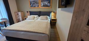 Voodi või voodid majutusasutuse Apartmány Špacír 3 toas