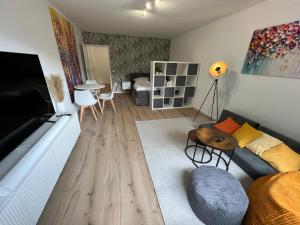 Μια τηλεόραση ή/και κέντρο ψυχαγωγίας στο Design-Apt Köln City mit Beamer +7 φωτογραφίες