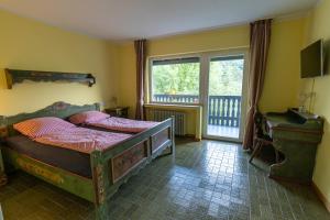 Ένα ή περισσότερα κρεβάτια σε δωμάτιο στο Hotel in der Strassen