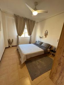 Postel nebo postele na pokoji v ubytování La casa de la Brisa