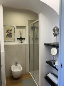 Koupelna v ubytování Sui tetti di Schio - Apartments guest house + 13 fotografií