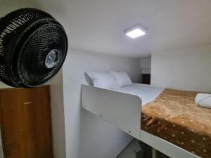 Galería fotográfica de Suíte privativa com cozinha e cama mezanino en São Paulo