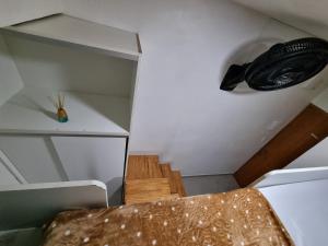 Galería fotográfica de Suíte privativa com cozinha e cama mezanino en São Paulo