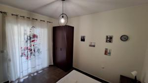 Postel nebo postele na pokoji v ubytování Daniel Studios