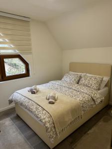 Ένα ή περισσότερα κρεβάτια σε δωμάτιο στο WoodAvenue