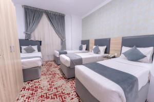 Katil atau katil-katil dalam bilik di Hayah Al Salam Al Fadi Hotel