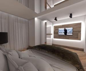 Televízia a/alebo spoločenská miestnosť v ubytovaní Apartament Silver - Stara Polana Spa