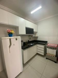 Dapur atau dapur kecil di Apartamento completo até 06 pessoas