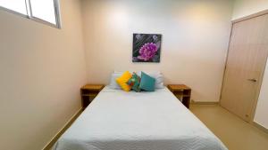 Ένα ή περισσότερα κρεβάτια σε δωμάτιο στο Magico Apartamento Frente al Mar 3 Habitaciones AR42