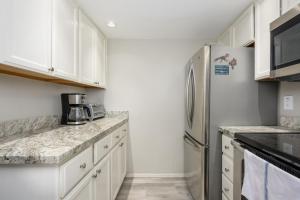 Η κουζίνα ή μικρή κουζίνα στο Villa Stone Creek condo