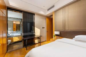 VanHao Serviced Apartment-Zhujiang Newtown-Near the US consulate-Vaperse the same building房間的床
