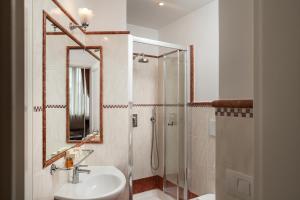 Un baño de Hotel Executive