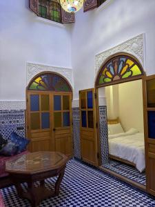 Ένα ή περισσότερα κρεβάτια σε δωμάτιο στο M & S Guest House