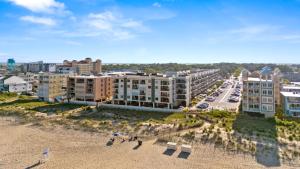 an aerial view of a city with buildings and a beach at Bright Oceanfront 2BR Condo Balcony, King Bed & Parking in Ocean City