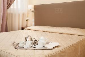 Cama o camas de una habitación en Hotel Executive