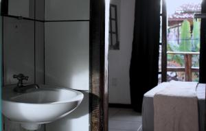 Ένα ή περισσότερα κρεβάτια σε δωμάτιο στο Rudá Hostel +8 φωτογραφίες