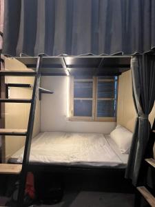 Heritage Corner Hostel客房内的一张或多张床位