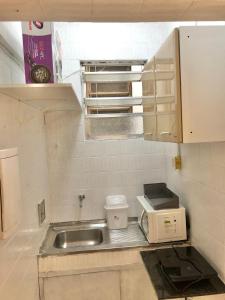 Una cocina o cocineta en Centro do Rio - Belo apartamento